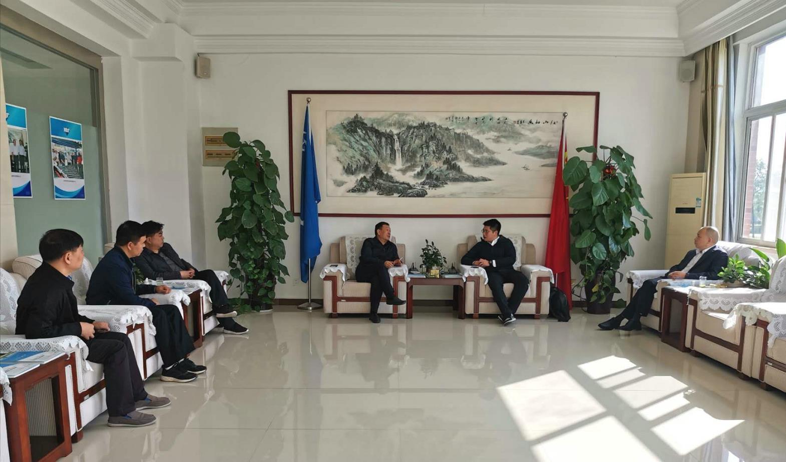 二七区工商联接待温州浙鲁建设开发股份有限公司考察团(图1)